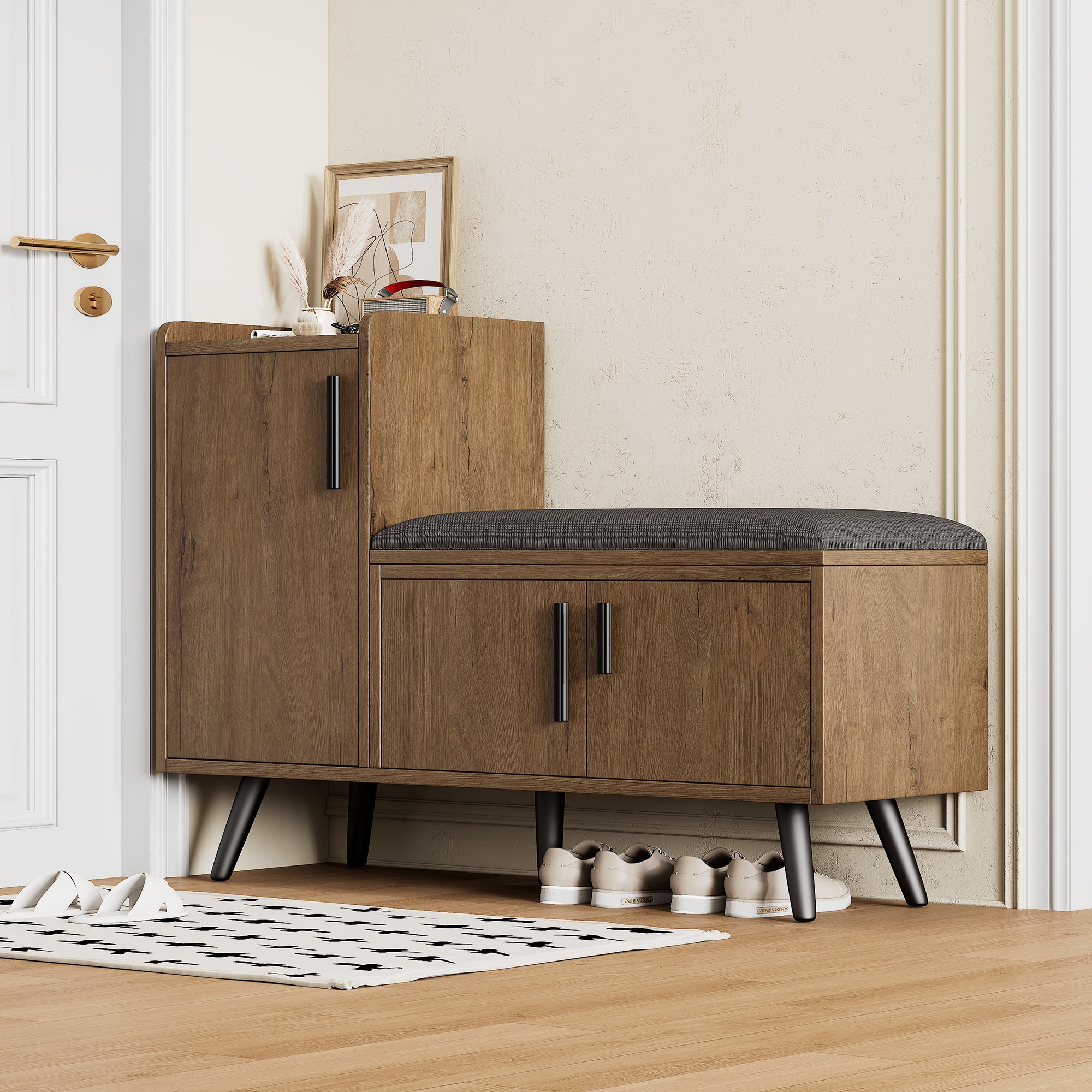 Modern shoe bench with three storage doors and multiple levels for storage, metal handles